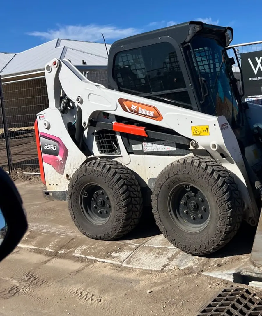 Bobcat skid steer loader parked on the hardstand at a Perth residential building site